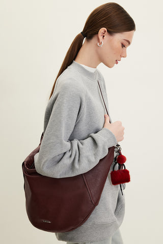 Soft Faux Leather Oval Crossbody Bag Burgundy