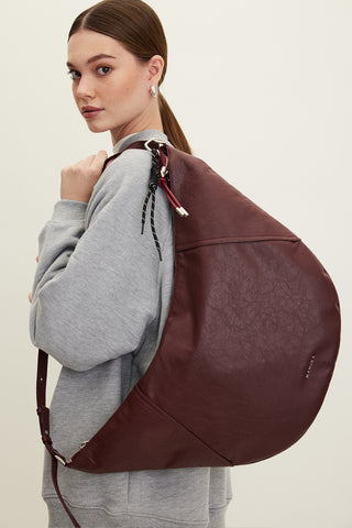 Soft Faux Leather Oval Crossbody Bag Burgundy