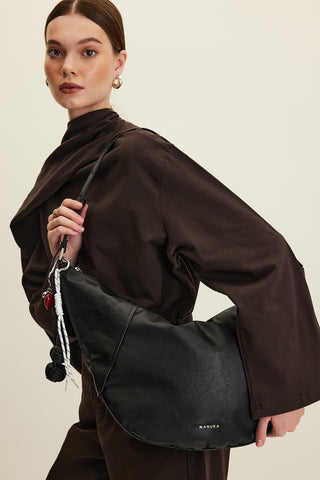 Soft Faux Leather Oval Crossbody Bag Black